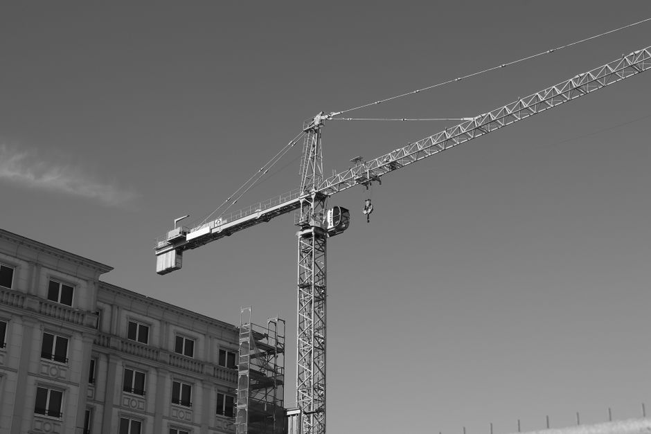 How to Design a Tower Crane Layout for a Congested Urban Site